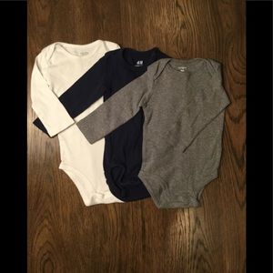 Set of 9 month long sleeved onesies